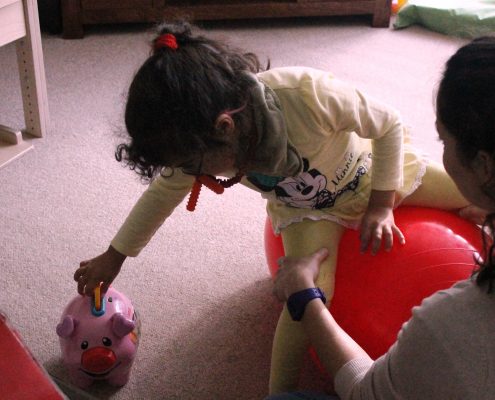Child playing during physiotherapy session